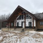 Concrete Log Cabin Sided Home
